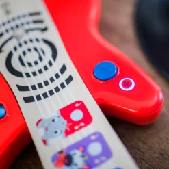Hape baby einstein                    Guitare connectée magic touch    Rouge