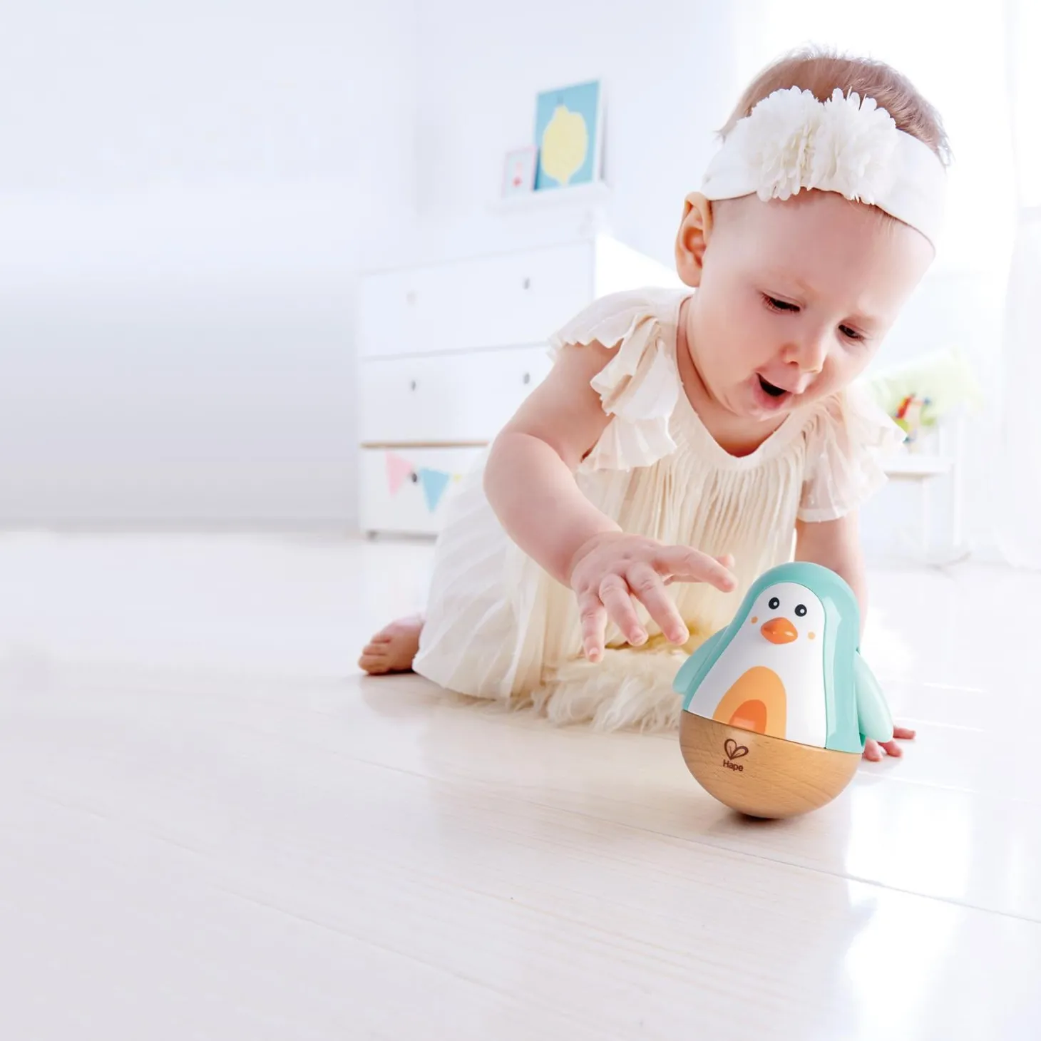 Hape Pingouin culbuto Blanc Et Turquoise