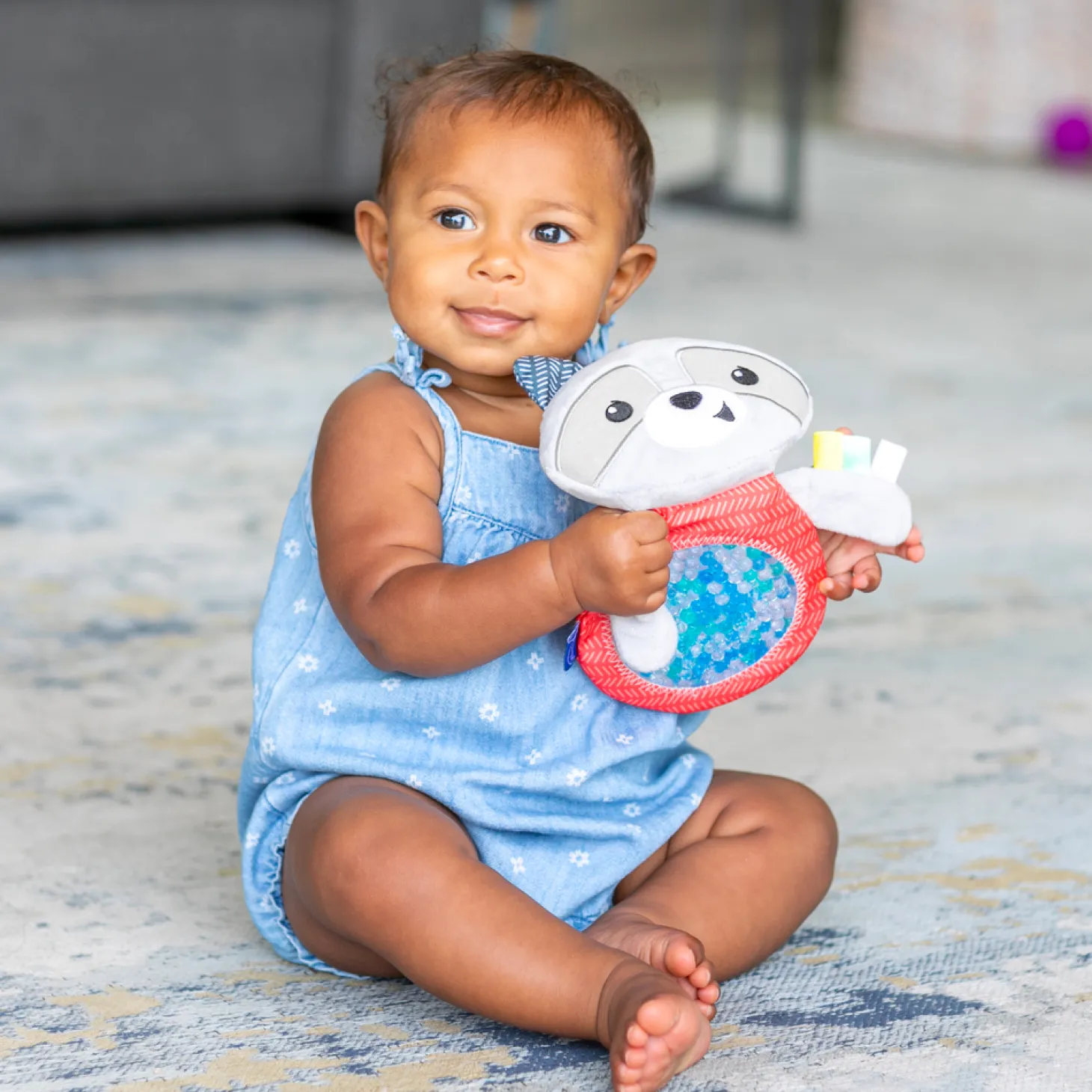 Infantino Mon doudou raton laveur sensoriel