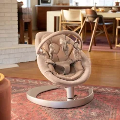 Nuna Transat Leaf grow avec son arche de jeux Teddy